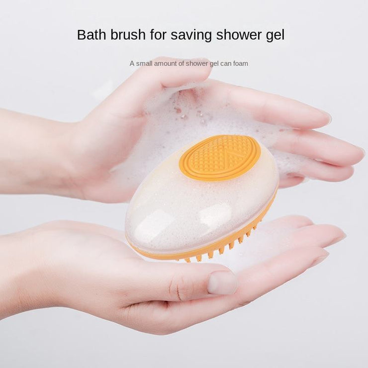 Shampoo-saving pet bath brush with foam reservoir