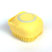 Dog grooming brush with shampoo holder