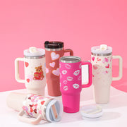 Set of colorful tumblers with various designs 