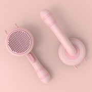 Portable cat grooming brush in pink color